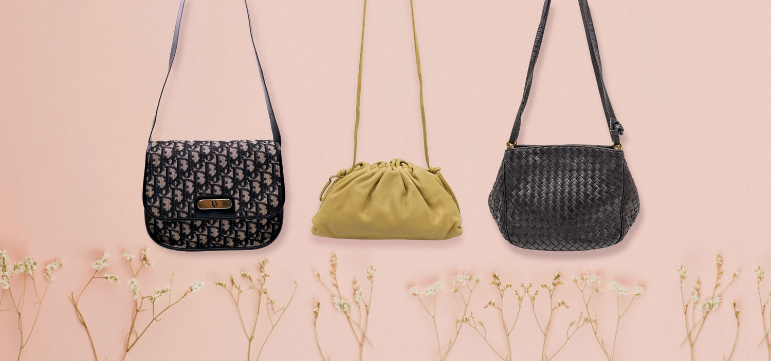 An iconic Dior and Bottega Veneta bags with light-pink background.