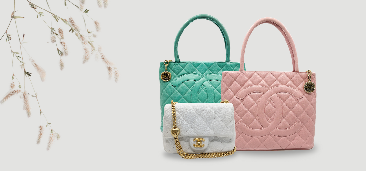 An iconic Chanel tote and cross body bags with light-gray background.
