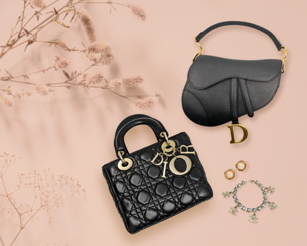 An iconic Dior bags flanked by Chanel accessories with light-pink background.