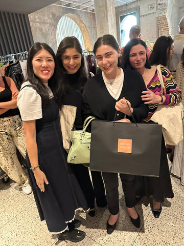 Photo showing the store owner and customers in the pop up event