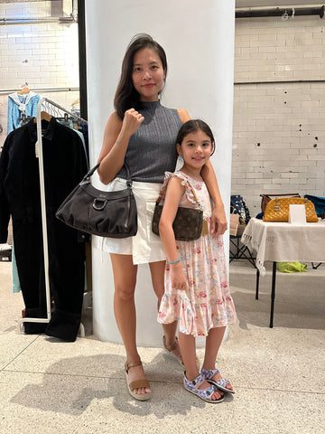 Photo showing the customer and her kid in the pop up event
