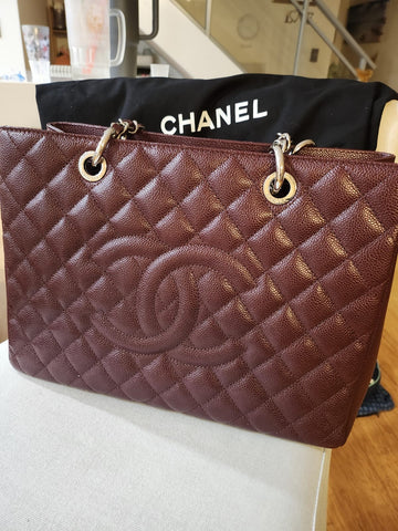 Photo showing a handbag being unboxed by the customer.